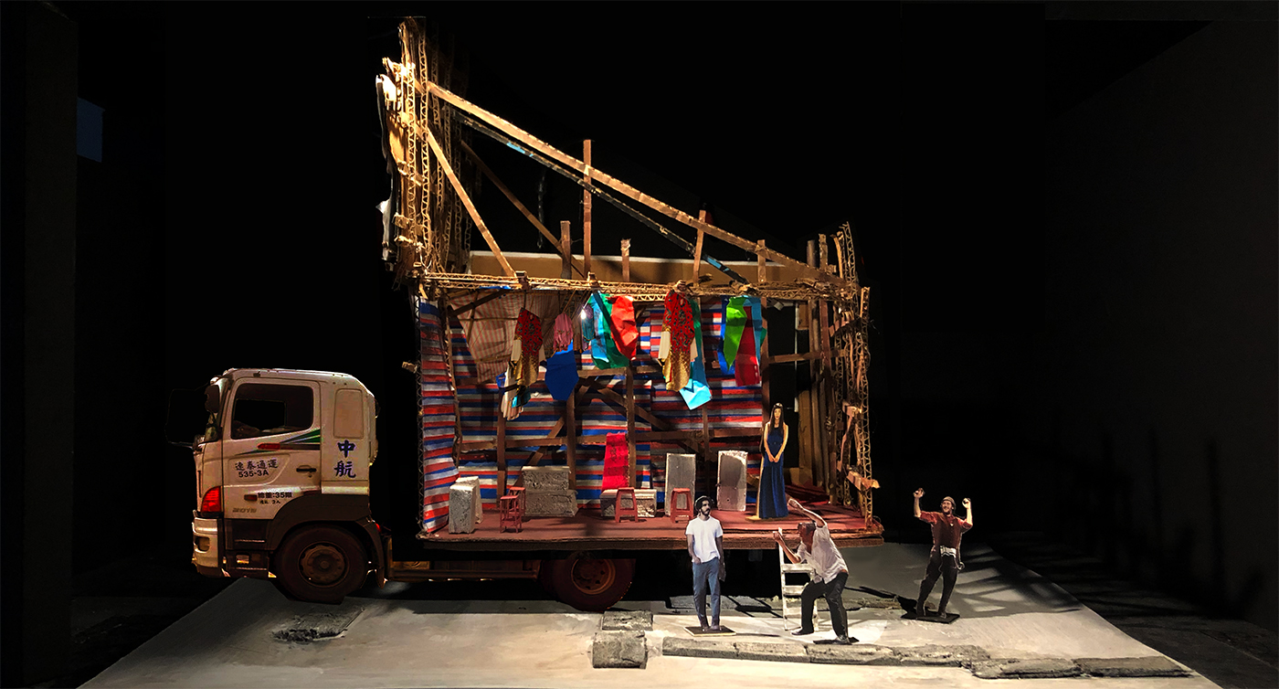 photograph of a 3 dimensional stage set made out of cut out photos